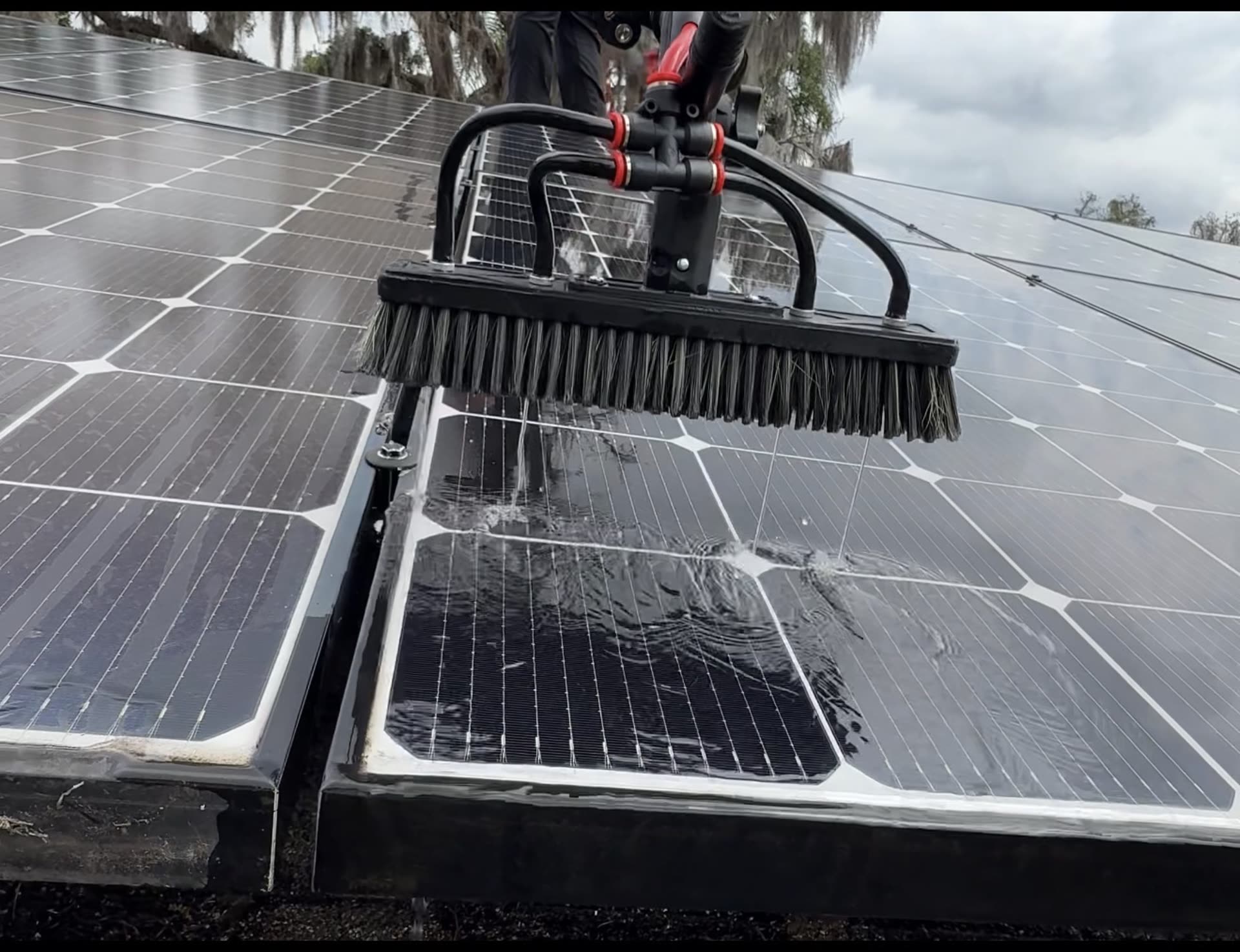 KleenSola brush cleaning solar panel sill