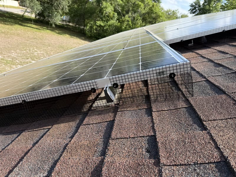 Critter guard mesh installed on solar panels